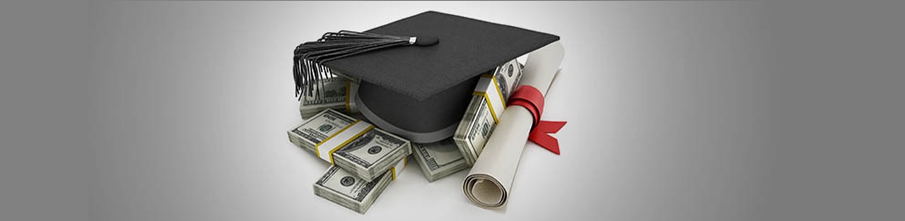 Graduate hat and degree on top of money